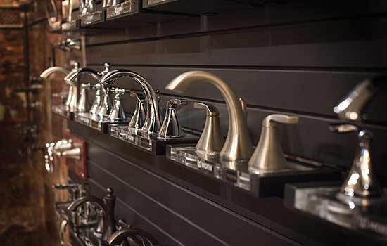 Display of kitchen hardware fixtures at a David Weekley Homes Design Center