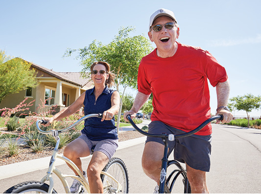 man and woman riding bicycles