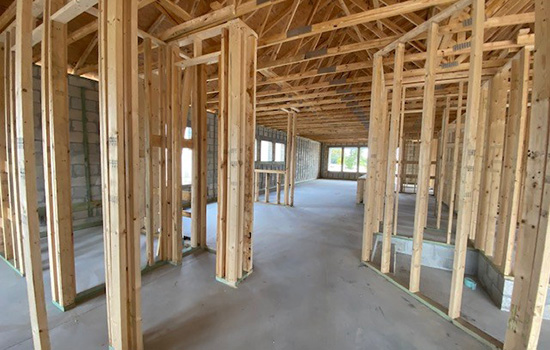 A David Weekley Home during the second step of home construction: building the frame of the home