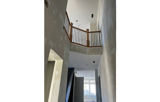 A David Weekley Home during the sixth step of home construction: installing the home’s doors, cabinetry and carpentry