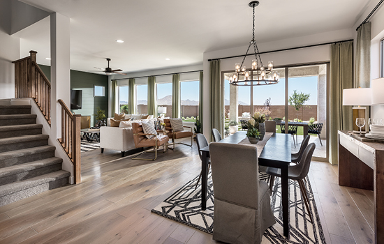 Large, energy-efficient windows allow living spaces of The Hummingbird Model Home in Phoenix to shine with natural light.