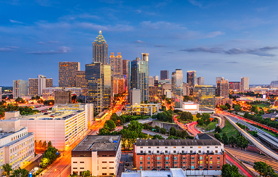 The Atlanta skyline in the evening, a beloved sight to long-time residents and people to relocate to Atlanta 