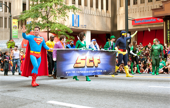 A Downtown Atlanta parade featuring fan dressed as their favorite comic book characters