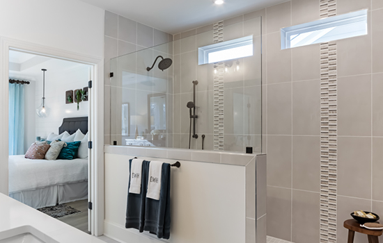 This David Weekley model home’s Owner’s Bath shows a Super Shower FlexSpace Option built instead of a separate tub and shower.