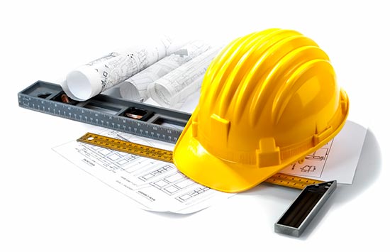 hard hat and construction plans