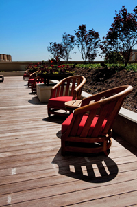 image of outside wooden deck with chairs